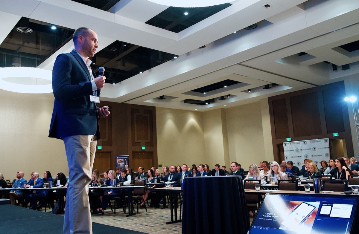 Nick Fischer, Founder of CHIROBASIX, speaking at a chiropractic marketing event