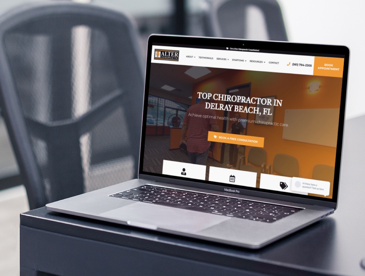 Chiropractic website design mockup on MacBook Pro